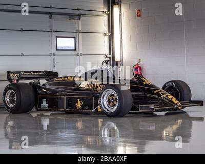 A 1982 JPS Lotus 91/7 F1 racing car driven by Katsu Kubota at Silverstone racing circuit, Towcester, Northamptonshire, UK 2019 Stock Photo