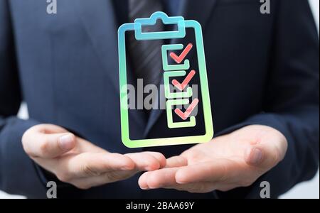 A Touching Check List on Visual Screen Stock Photo