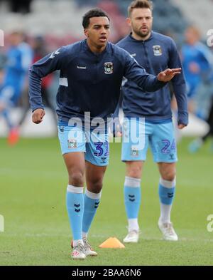 Coventry City's Sam McCallum warming up before the game Stock Photo