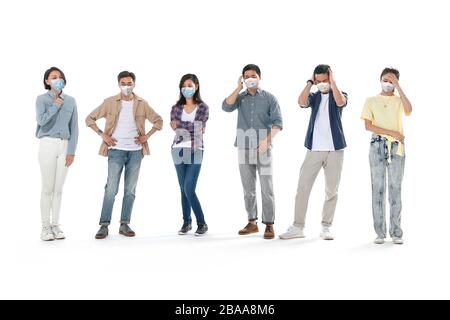 Wearing a mask of the young people Stock Photo