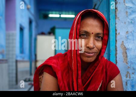 Portrait of woman in red in Jodhpur, the Blue City, Rajasthan India Stock Photo