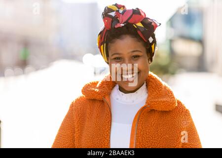 Afro american woman in an urban city area Stock Photo
