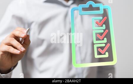 Touching Check List on Visual Screen Stock Photo