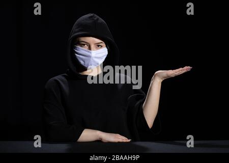 Protective respiratory mask for people that reduces the risk of infection with viruses and bacteria. Stock Photo