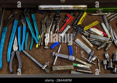 An open toolbox drawer filled with various handtools Stock Photo