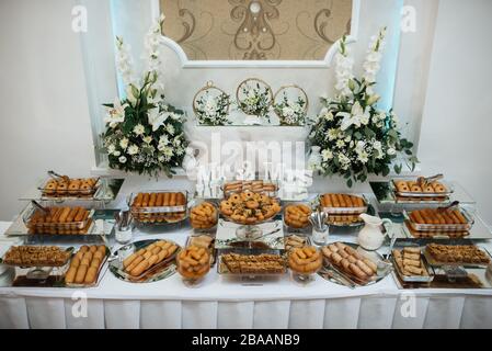 Delicious decorated biscuits on the table. Party and food Stock Photo