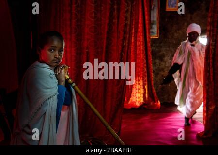 Africa, Ethiopia, Adadi Mariam.  Religious procession in Adadi Mariam. A young devote holds a cane Stock Photo