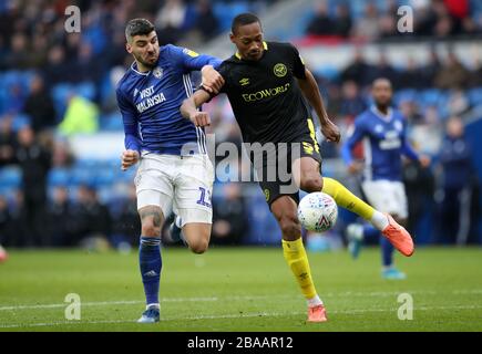 Brentford's Ethan Pinnock clears the ball away from Cardiff City's Callum Paterson Stock Photo