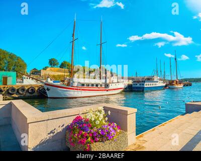 Pier with touristic ships in harbour of Oslo port. Norway, Scadinavia Stock Photo