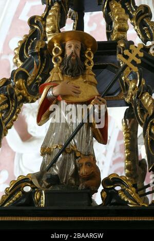 Saint Jerome, statue on the pulpit in the Church of Saint Catherine of Alexandria in Zagreb, Croatia Stock Photo