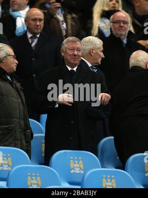 Manchester United's manager Sir Alex Ferguson in the stands Stock Photo