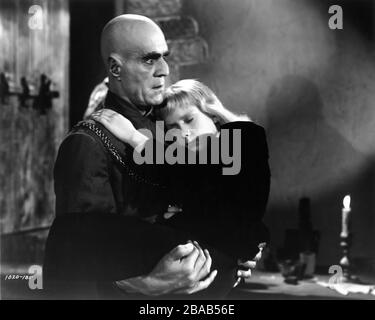 BORIS KARLOFF as Mord the Executioner with JOHN HERBERT-BOND as young ...