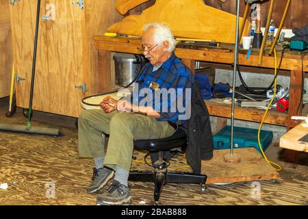 Nathan Jackson at Totem Carving Workshop at Saxman Native Village Dance Performance and Totem Park cruise ship excursion in Ketchikan, Alaska. Stock Photo