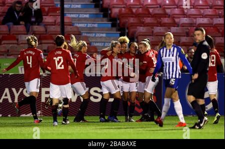 Manchester United's players celebrates their first goal after Brighton and Hove Albion goalkeeper Megan Walsh (not in picture) scores a own goal Stock Photo