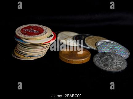 Close up of a collection of pogs and slammers, the popular child's toy of the 1990's.  Colorful disks made from the milk bottle caps Stock Photo