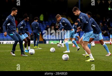 Coventry City players warming up before the game Stock Photo
