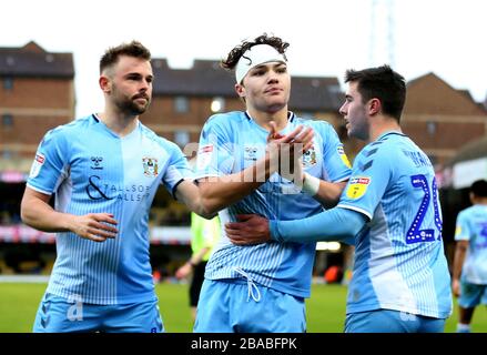Coventry City's Callum O'Hare (centre) celebrates scoring his side's first goal of the game with team-mates Stock Photo