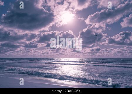 Abstract seascape background in pink and blue colors. Beautiful dramatic cloudy sky background Stock Photo
