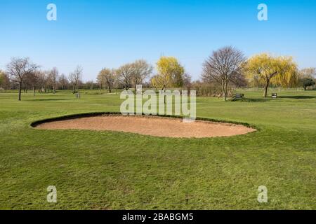 Big sand trap bunker on a golf course Stock Photo