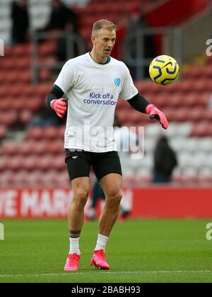 Burnley goalkeeper Joe Hart warming up wearing a Heads Up campaign t-shirt Stock Photo