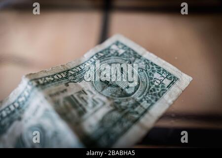 closeup of a crumpled one dollar bill Stock Photo