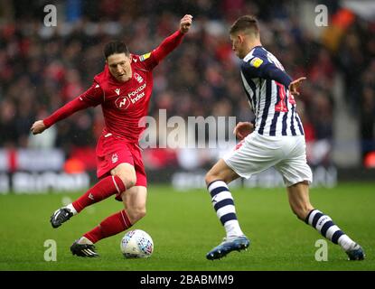 West Bromwich Albion's Conor Townsend (right) and Nottingham Forest's Joe Lolley battle for the ball Stock Photo