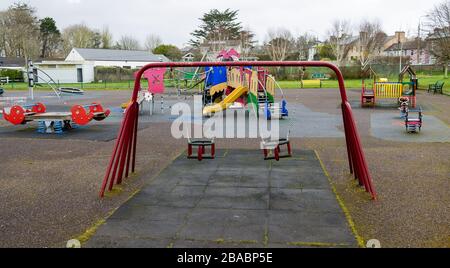 Empty children's playground due to Coronavirus precautions skibbereen Ireland Stock Photo