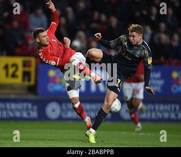 Charlton Athletic's Jake Forster-Caskey and Barnsley's Kilian Ludewig battle for the ball Stock Photo