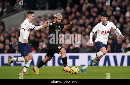 Manchester City's Sergio Aguero (centre) in action with Tottenham Hotspur's Giovani Lo Celso (left) and Son Heung-min during the Premier League match at the Tottenham Hotspur Stadium, London. Stock Photo