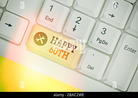 Writing note showing Happy 60Th. Business concept for a joyful occasion for special event to mark the 60th year Stock Photo