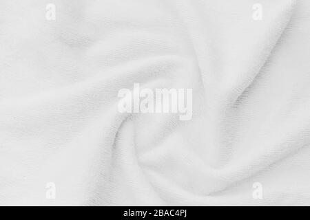 White fabric abstract background concept. white wrinkled silk cloth wave  texture satin material Stock Photo