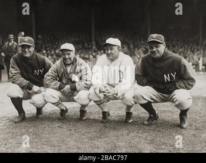 Babe Ruth in baseball uniform standing in dugout Stock Photo - Alamy