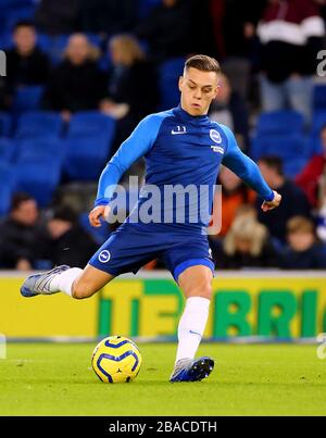 Brighton and Hove Albion's Leandro Trossard warms up before the match Stock Photo