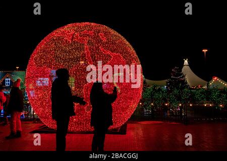 illuminated structure of the world globe at Illumi Cavalia festival Stock Photo