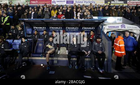 Liverpool's Trent Alexander-Arnold (back left to right), Alex Oxlade-Chamberlain, Ki-Jana Hoever, Naby Keita, Roberto Firmino and Mohamed Salah sit in the dugout Stock Photo