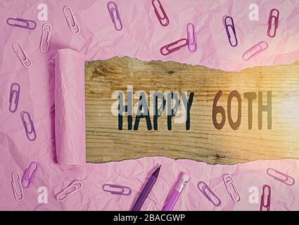 Writing note showing Happy 60Th. Business concept for a joyful occasion for special event to mark the 60th year Stock Photo