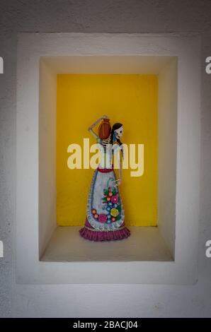 Mexican skull art on display outside a shop in Sayulita, Mexico. Stock Photo