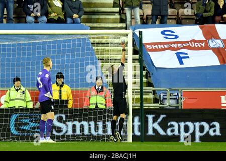 Match referee David Webb stops the game to check the goal line technology is working properly Stock Photo