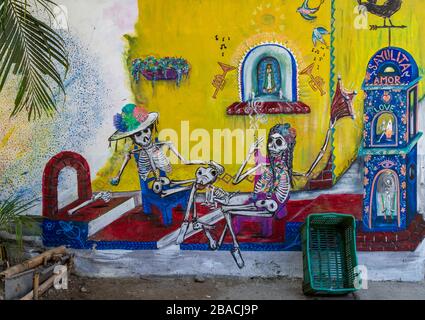 Dia de los Muertos (Day of the Dead) themed street art on the side of a store in Sayulita, Nayarit, Mexico. Stock Photo