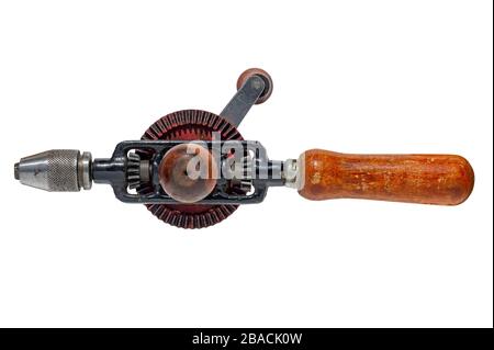 Old rusty hand drill.  Isolated on a white background. Stock Photo