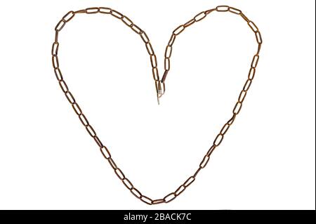old rusty chain. Heart shape. Isolated on a white background. Stock Photo