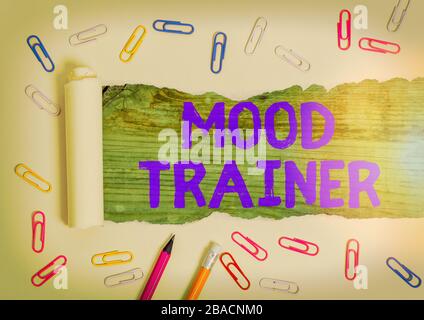 Handwriting text Mood Trainer. Conceptual photo a demonstrating who trains to alleviate mood disorders Stock Photo