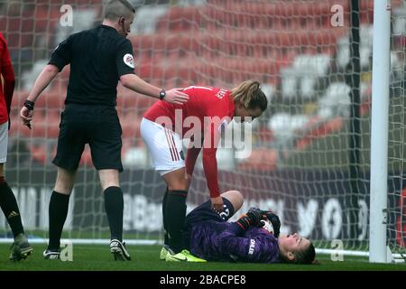 Manchester United women goalkeeper Mary Earps takes a knock Stock Photo