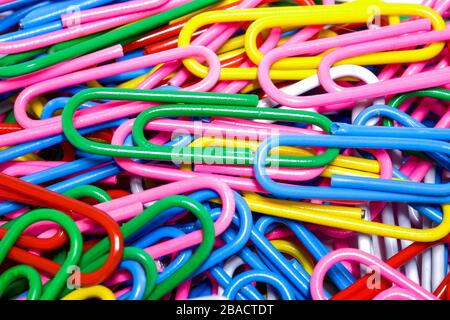 Close-up group of multicolored paper clips, A tool used for office and school Stock Photo