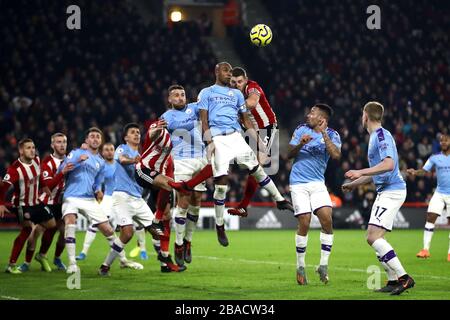 Manchester City's Fernandinho (left) and Sheffield United's Jack O'Connell battle for the ball Stock Photo