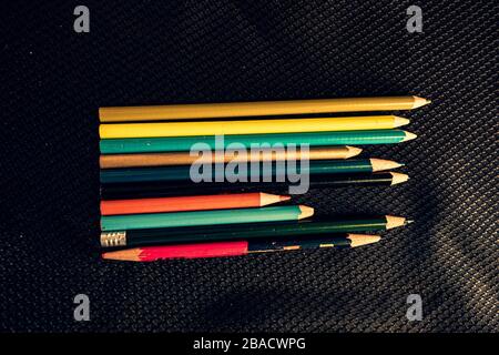 set of colorful pencils of various lengths Stock Photo