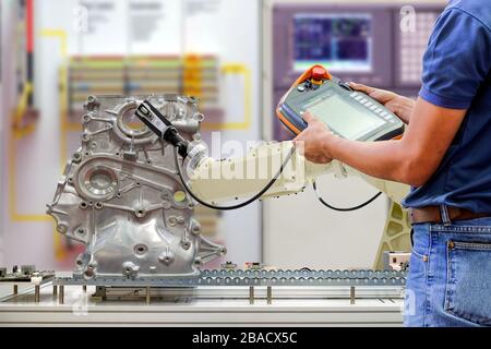 Automated robotic scanning automotive part engine in smart factory ...
