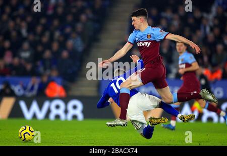 West Ham United's Declan Rice (right) and Leicester City's James Maddison battle for the ball Stock Photo