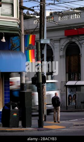 Man waiting to cross street as a truck passes by, Castro District, San Francisco, California, United States, North America, color Stock Photo