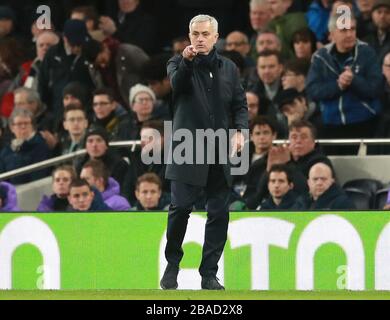 Tottenham Hotspur manager Jose Mourinho instructs his players during the game Stock Photo